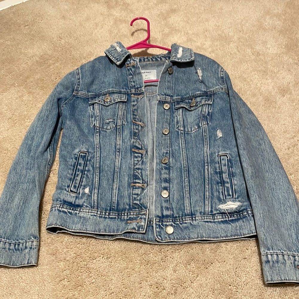 Distressed blue jean jacket